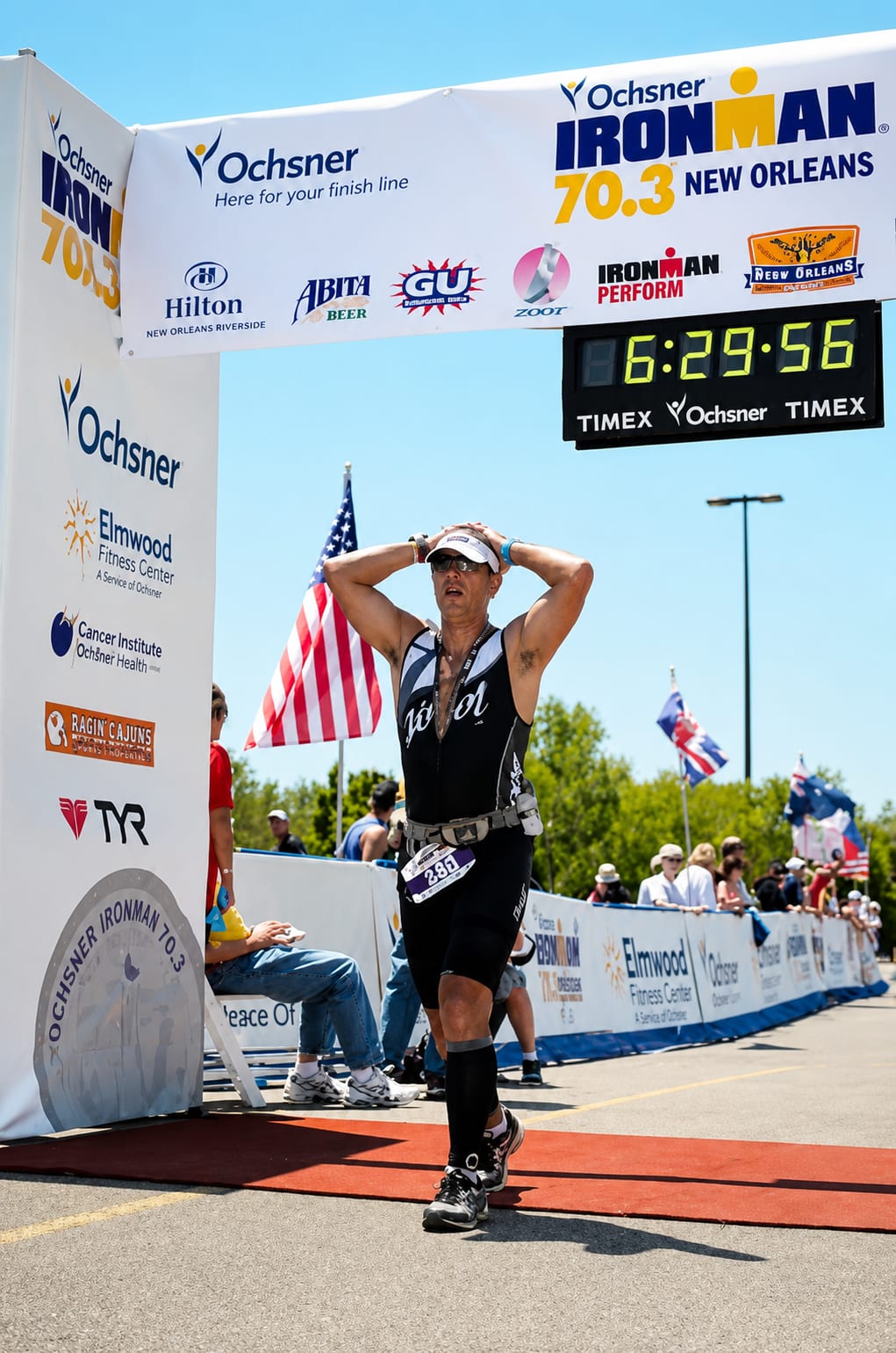 Joshua Teixidor finishing an IRONMAN 70.3 triathlon